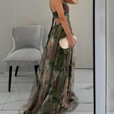 Céline | Robe maxi fleurie à taille haute et bretelles réglables