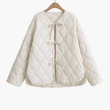 Élodie | Veste matelassée femme à nœuds, coupe élégante