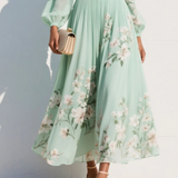 Clara | Robe midi femme plissée à col V et coupe évasée