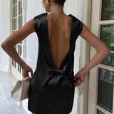 Iséa | Robe d'été en satin dos nu avec nœud élégant