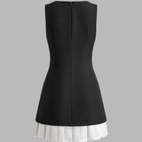 Lunara | Robe midi sans manches à design plissé élégant