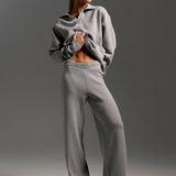 Indy | Ensemble femme avec un pull polo oversize et un pantalon large en couleur sable