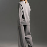 Indy | Ensemble femme avec un pull polo oversize et un pantalon large en couleur sable