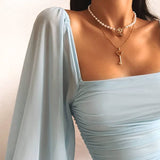 Maëllea | Mini robe bodycon à manches bouffantes bleu clair