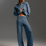 Indy | Ensemble femme avec un pull polo oversize et un pantalon large en couleur sable