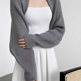 Suzanne | Elvora – Cardigan femme oversize en maille côtelée